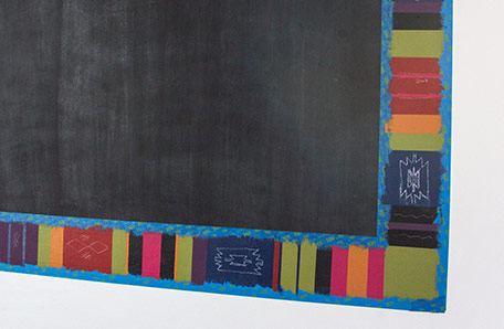 chalkboard painted area with some sections of border painted