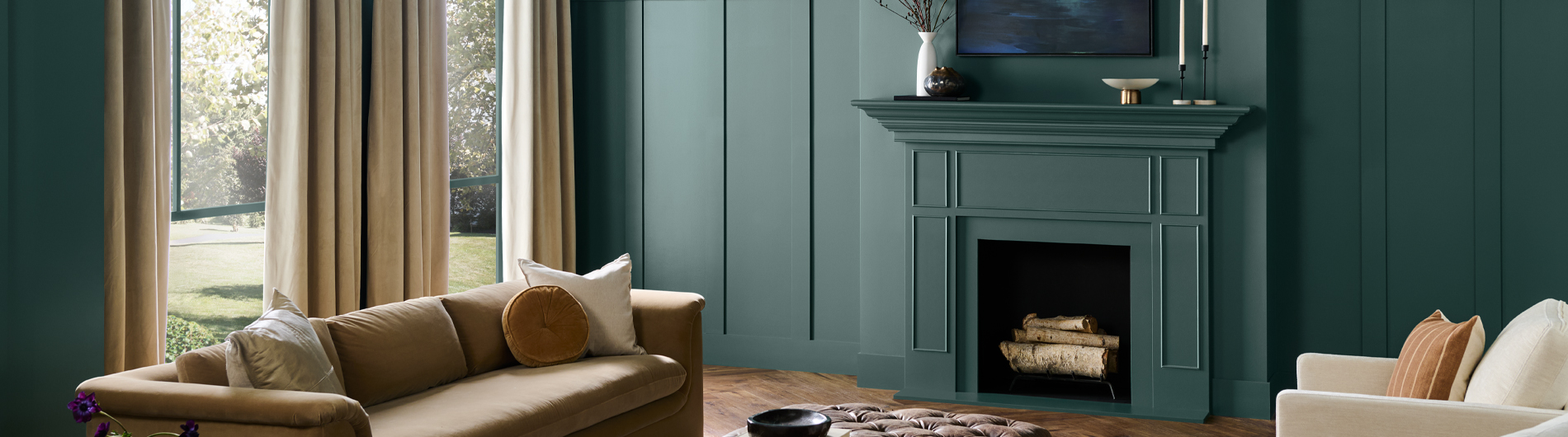 A tight crop of a fireplace in a room with the walls painted in the color Canyon Dusk