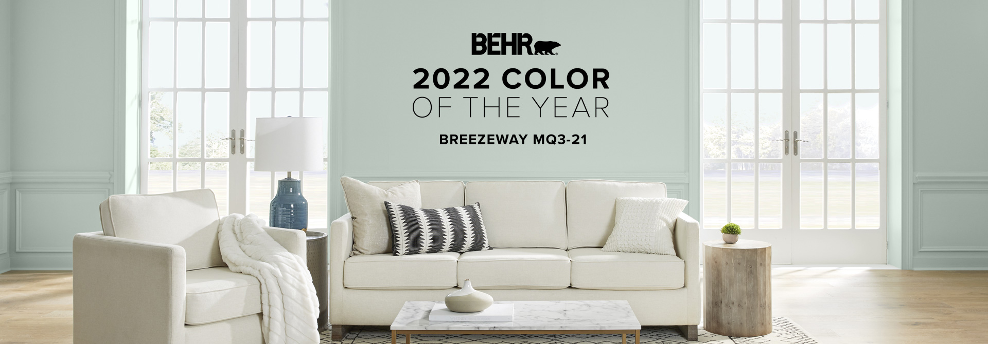 Banner image of living room painted in Breezeway, featuring Behr Color of the Year, Breezeway.