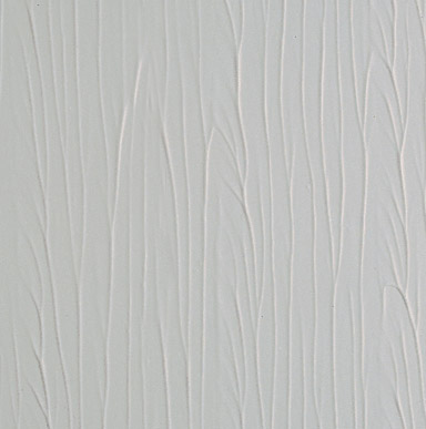 Close up image of of a surface with unintentional textured pattern left in the paint by the roller.