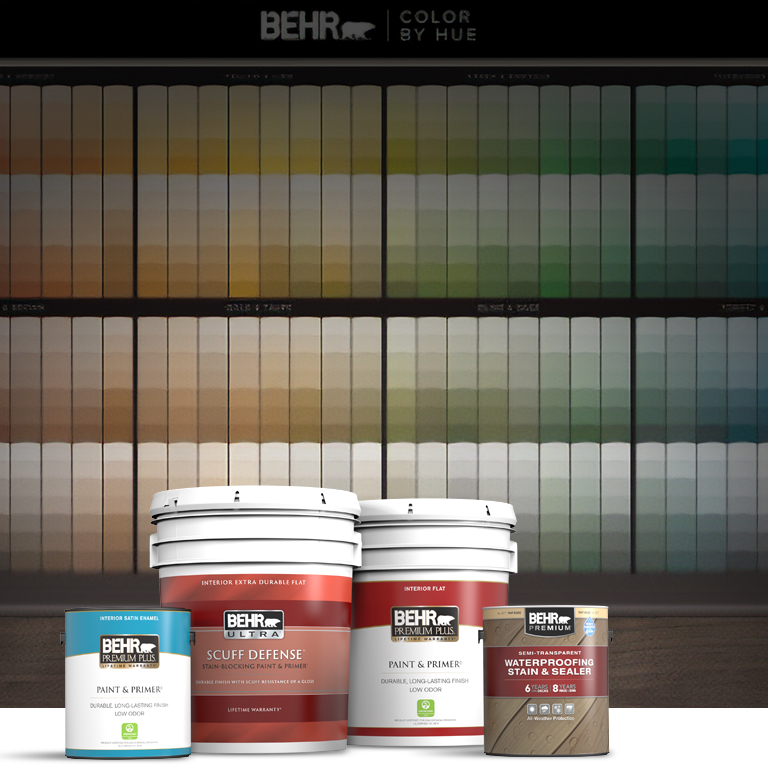 BEHR Paint  and Stain Cans in front of  the BEHR Color Center
