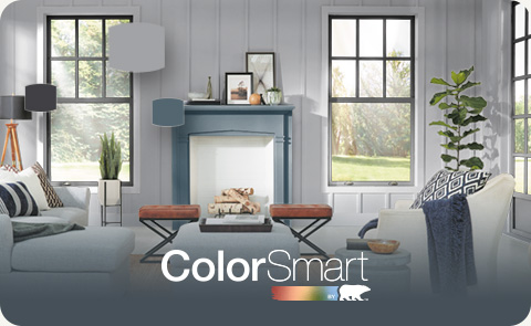 Painted living room with the ColorSmart by BEHR logo in the foreground
