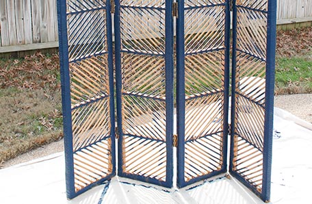 partially painted rattan folding screen