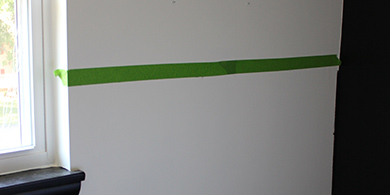 Tape line across the wall to divide colors