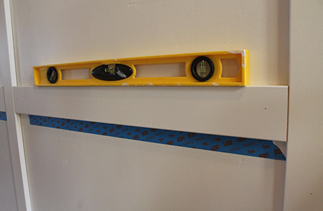 Leveling boards before nailing them in