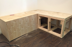 banquette with partially applied plywood surface
