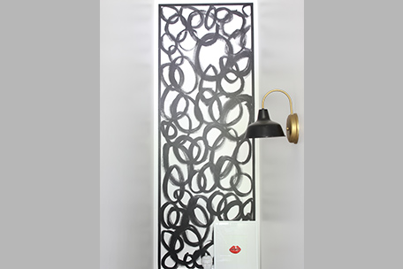 finished stairwell accent wall with decorative wall lamp