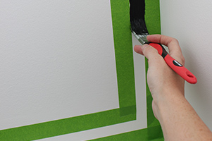 frame of accent wall being painted