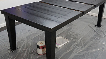 Table with the first coat of black paint