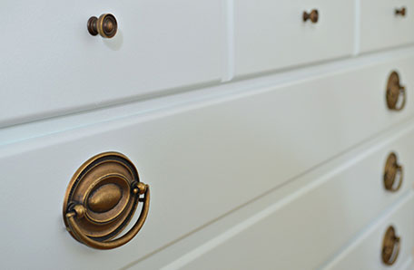 close up of brass drawer hardware