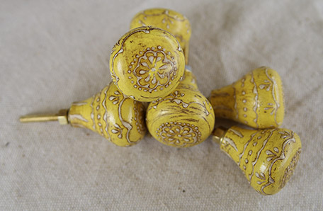 yellow decorative drawer pulls in pile