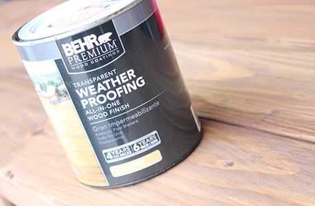 can of Behr all in one weatherproofing finish