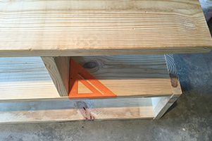 Make sure the shelf supports are square before attaching them