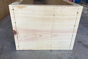 Line up the end pieces with the long boards