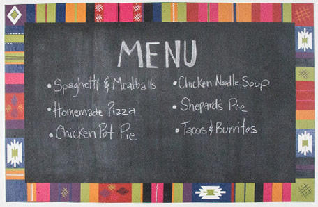 front view of finished Turkish rug inspired chalkboard with menu written on it