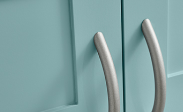 Close up of spray painted cabinet door showcasing advanced hide