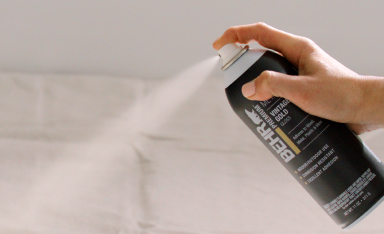 Close up of Behr Premium Spray Paint's comfortable spray actuator