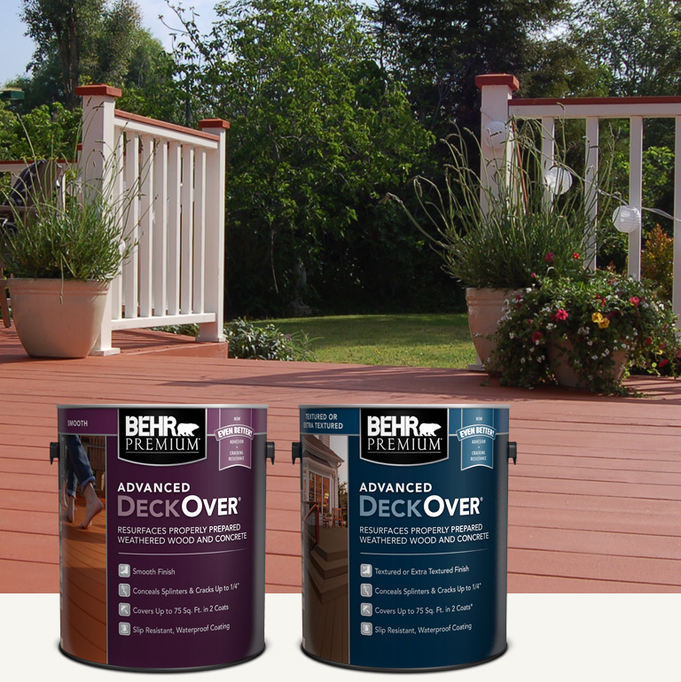 Two cans of Behr Premium Advanced DeckOver Coating with a wooden deck, product can, and brush in the background mobile
