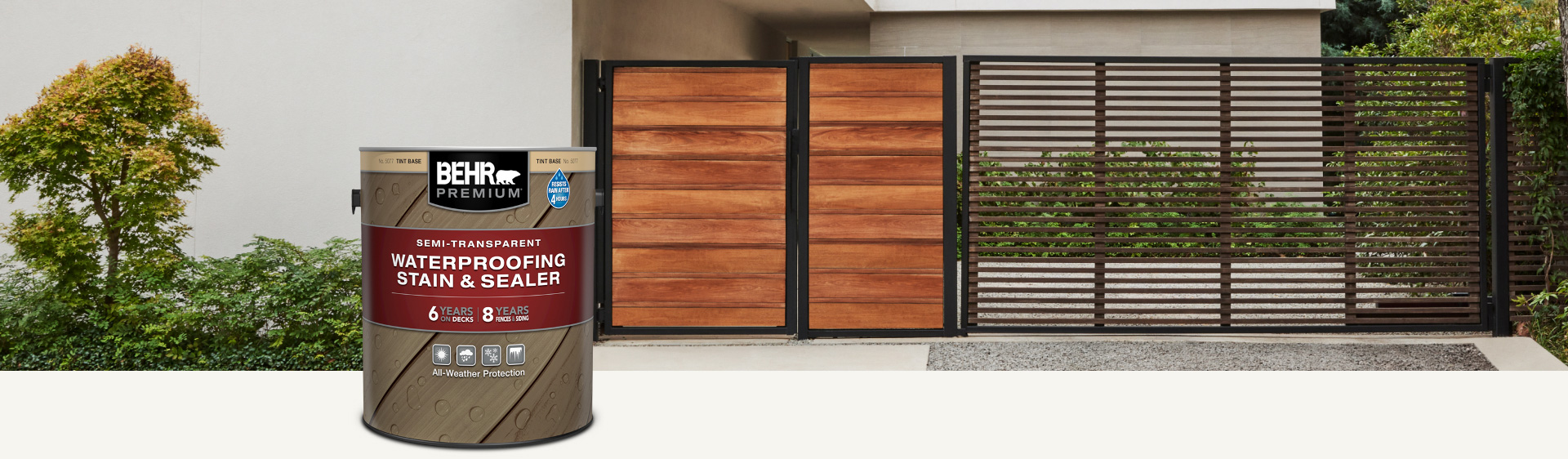 One can of Behr Premium Semi-Transparent wood stain with a wooden deck in the background