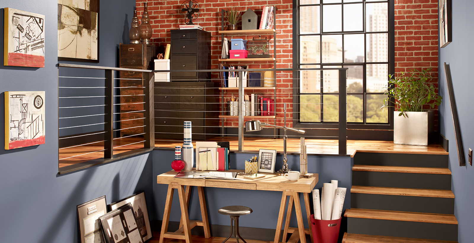 Industrial office workspace with blue walls and brown trim, wooden desk, relaxed and calming style.