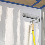 Roll paint onto walls.