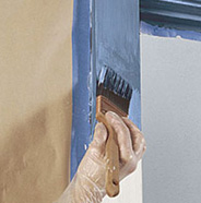 Painting garage door trim.