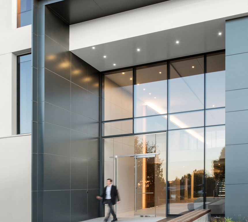 An exterior office entrance with large glass windows mobile.
                Whisper White HDC-MD-08
                