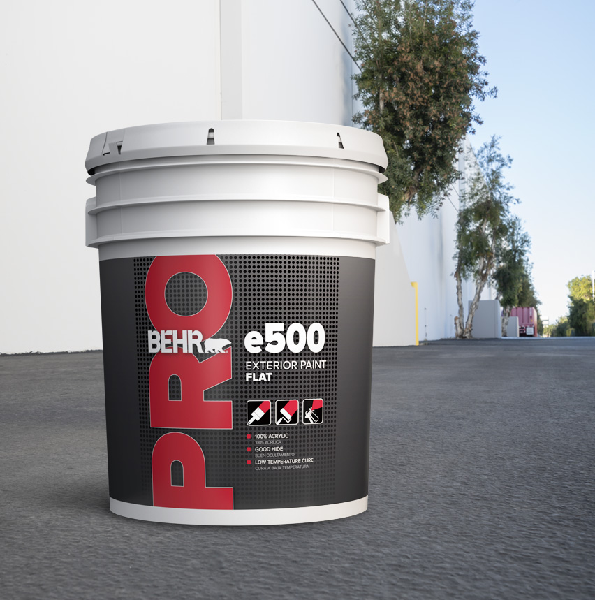 Pail of Behr Pro e500 in front of industrial building.