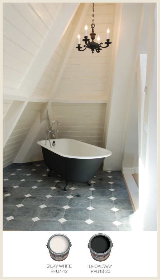 All white bath with black tub