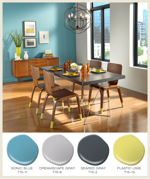 An urban dining room, decorated with modern furniture.  Dining chair legs are painted in a bright limy color called Plastic Lime. 