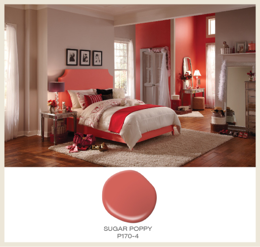 A girl's bedroom with coral pink accents. 