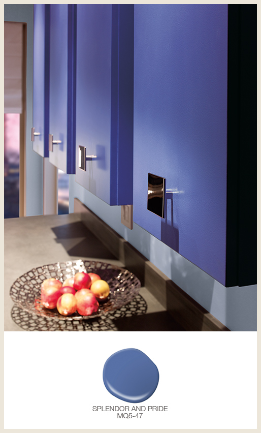 A modern kitchen cabinets painted in an electric blue color.