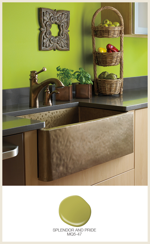 A kitchen's back splash painted with a bold green color.