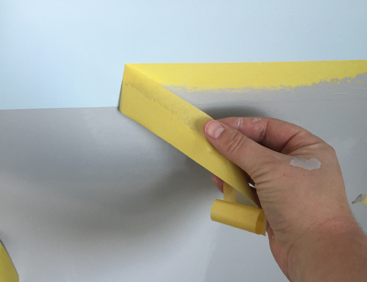 removing tape from wall