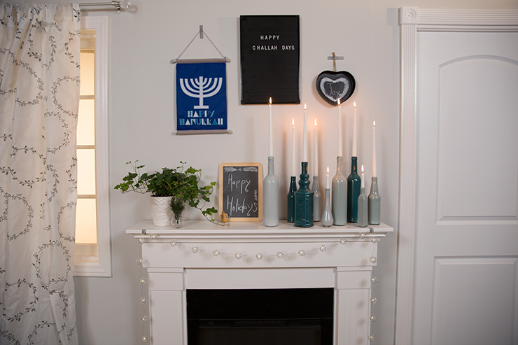 A mantel decorated for Hanukkah