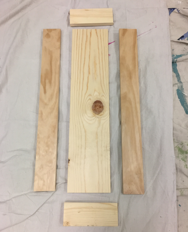 The five pieces of wood that is needed to make the mantel box. 