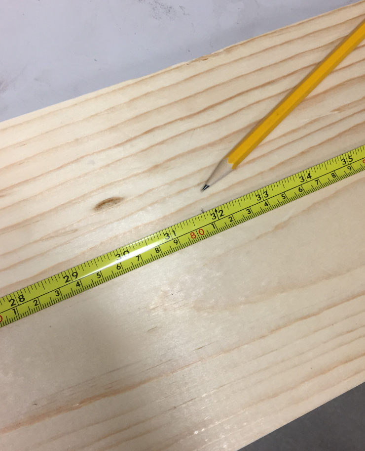 Wood plank, measuring tape, and a pencil.