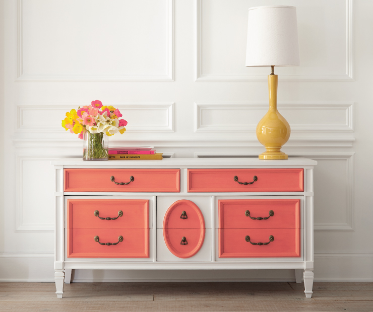 A dresser showing the top panel of the drawers painted in Guava Jelly.