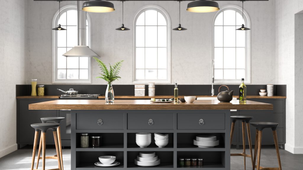 A dark gray industrial kitchen showcasing cabinets and kitchen island. 