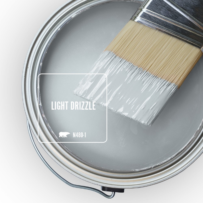 An open paint can overview featuring a light  blue color called Light Drizzle. 