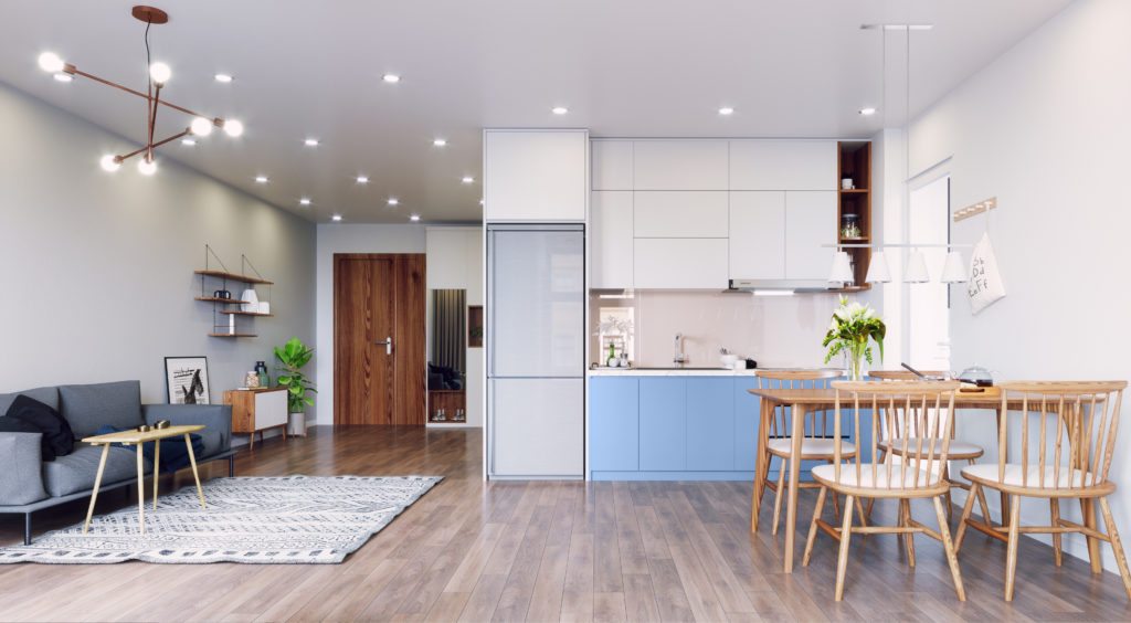 An open floor apartment with living, dining areas and a kitchenette, lower cabinets are painted a blue color called Bluebird.