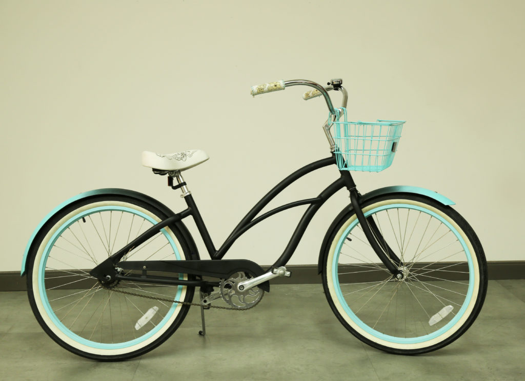 Bicycle painted in Black and Light Blue, side view.
