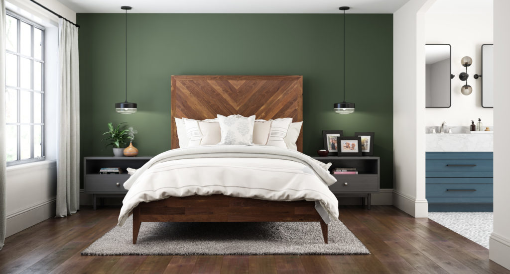 Bedroom painted in an accent wall in Royal Orchard a deep forest green. 