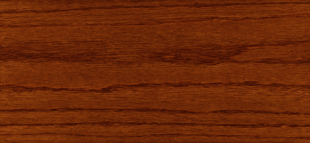 A wood stain sample in the color Antique Walnut, a red-tone medium brown.