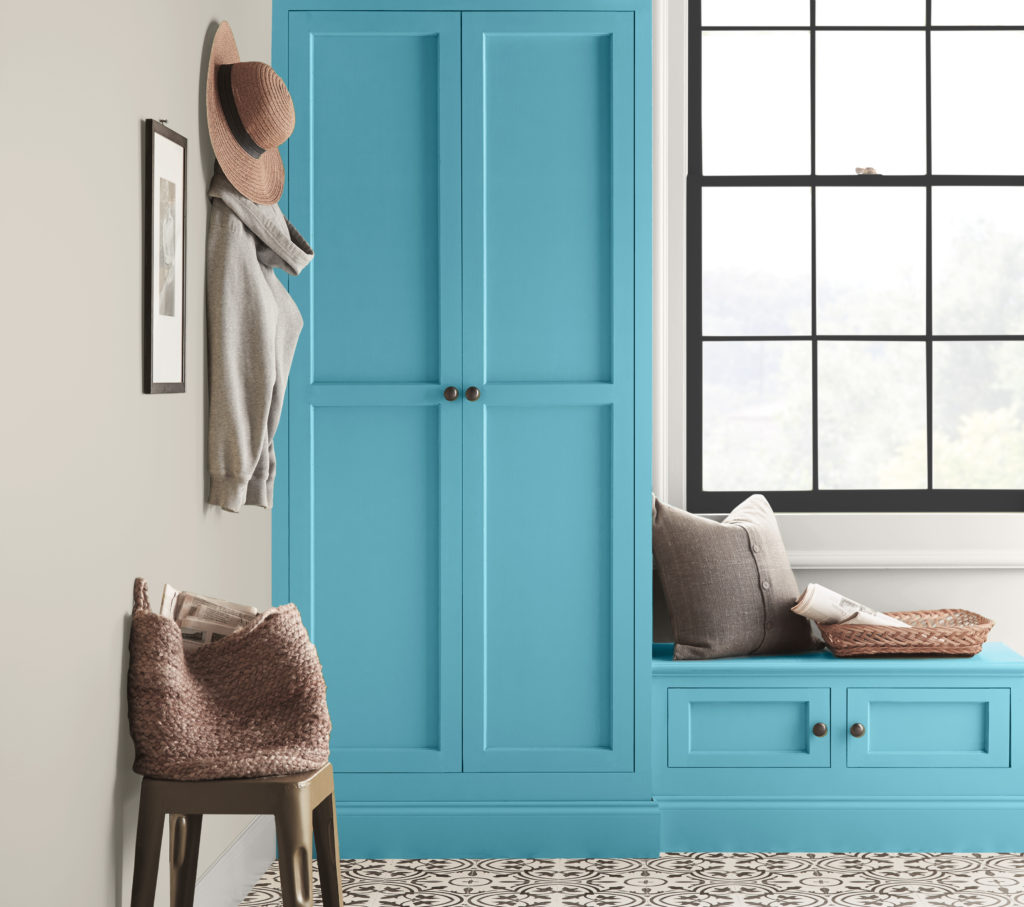 Mudroom with wall unit in Explorer Blue as an accent. 