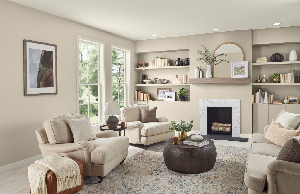 A casual and cozy living room space painted and decorated in a tone-on-tone color scheme. 
