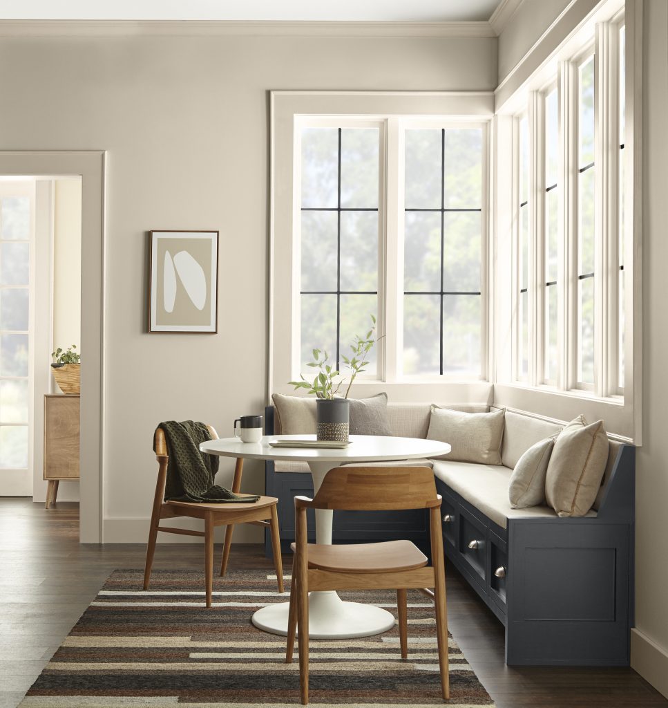 A modern farmhouse breakfast nook. Walls and trim are painted the same beige color to give this space a more modern look.  