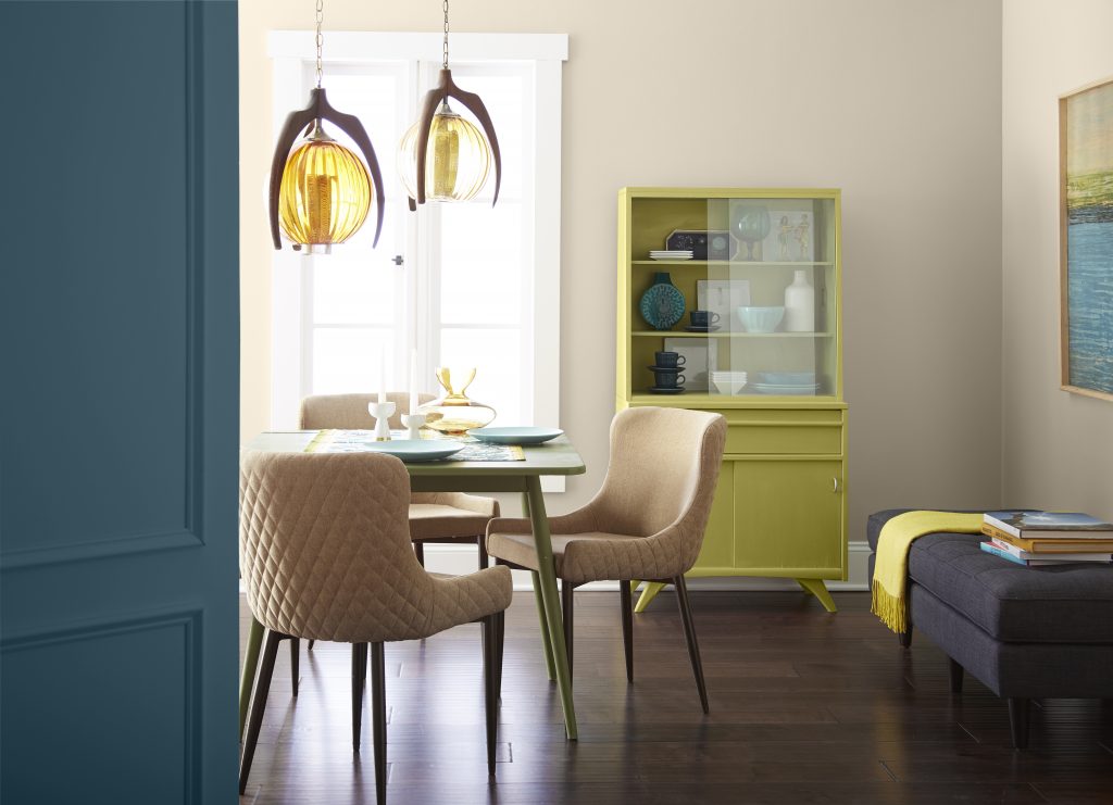 A retro inspired dining area with lime green and blue color accents. 