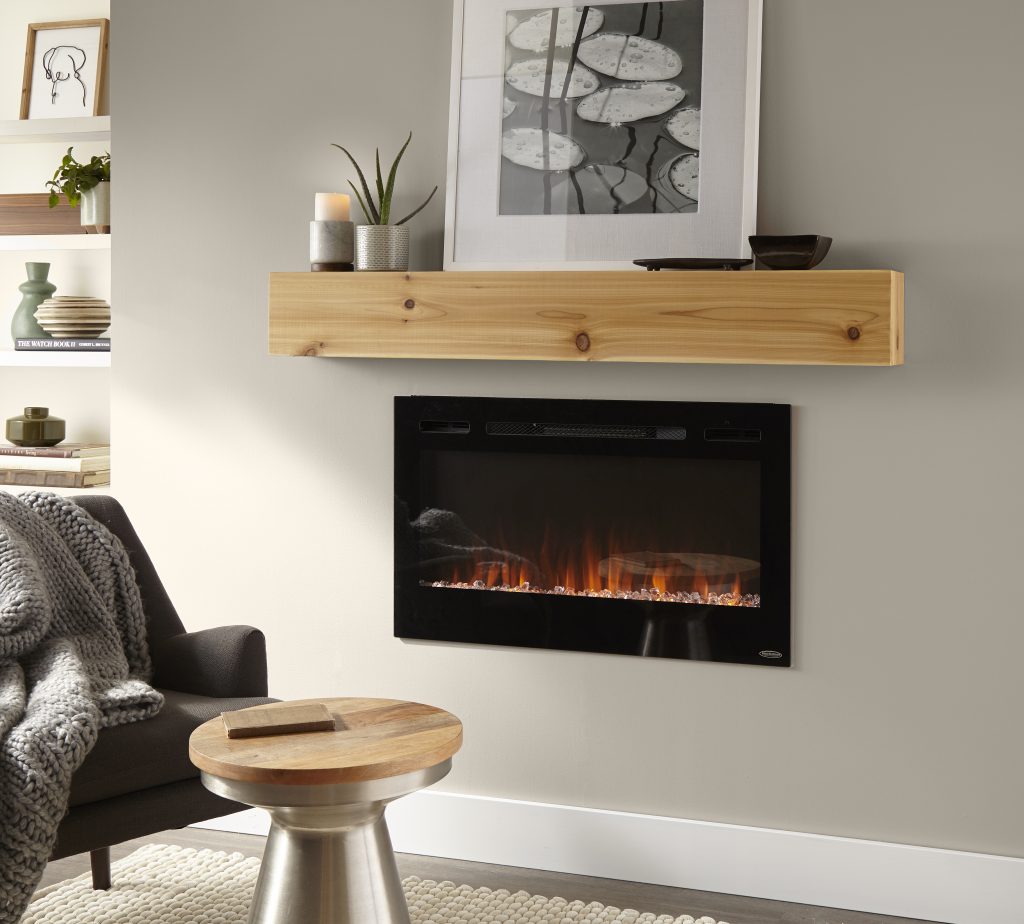 A cozy fireplace set into a wall with a mantel above. The wall color is painted in a warm greige hue.