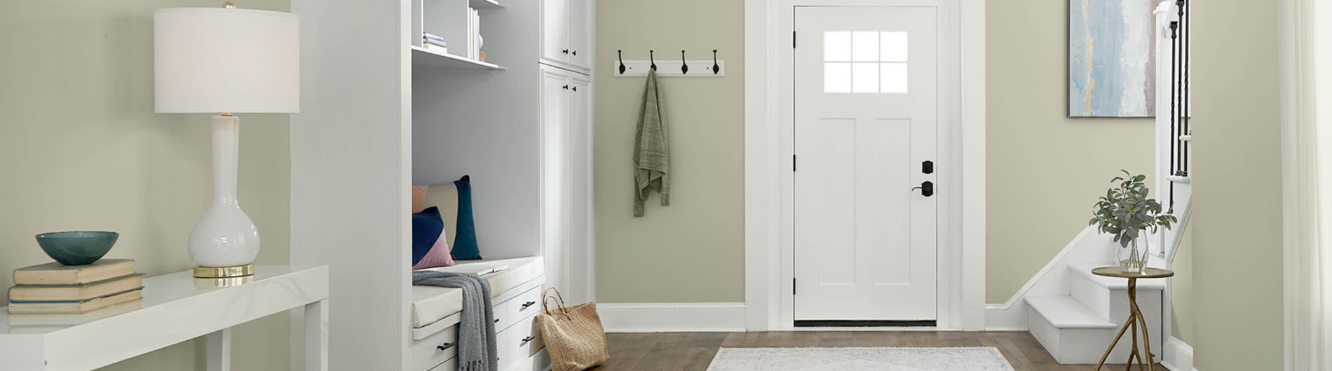Built-in cabinet with open shelving painting in the color Gratifying Gray.